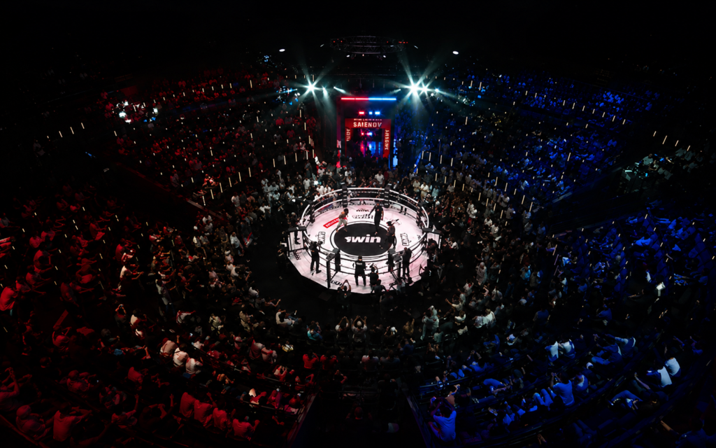 Packed arena crowd watching Arman Tsarukyan vs Ankit Baiyanpuria submission grappling match at Hype Armenia in Yerevan
